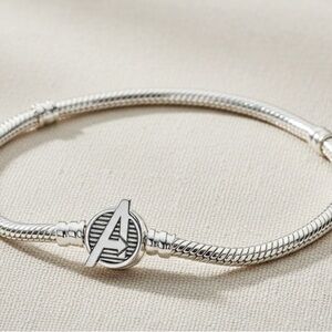 Silver Bracelet with Logo Charm